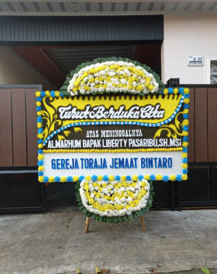 Papan Bunga Duka di Sidoharjo